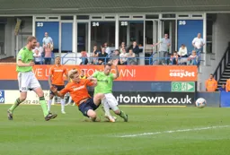 Cameron McGeehan is quickest to the ball and puts Luton ahead