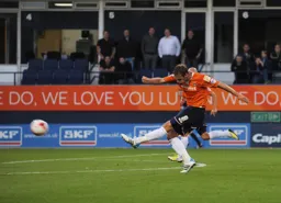 Andy Drury fires in a shot