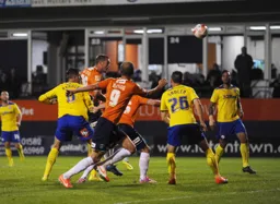 Luke Wilkinson heads for goal