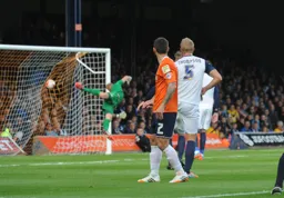 Alex Lawless admires the finish