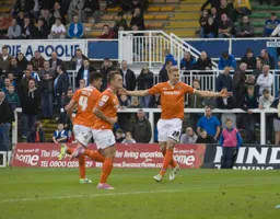 Jim Stevenson celebrates his goal