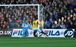 Mark Tyler saves at close range