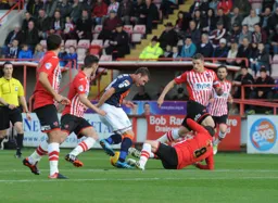 Andy Drury surrounded