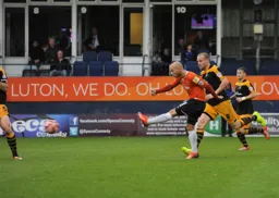 Luke Guttridge fires home