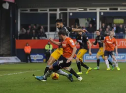 Andy Drury gets his cross in