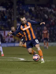 Ricky Miller moves forward