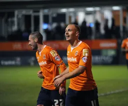 Jakes Howells celebrates his goal with Michael Harriman