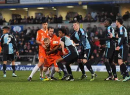 Mark Cullen tries to break his markers grasp
