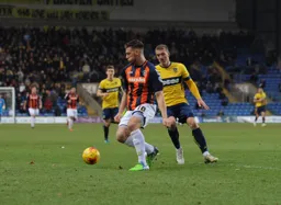 Alex Wall holds the ball up