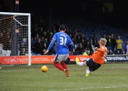 Mark Cullen slides in to score
