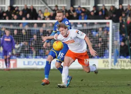 Scott Griffiths holds off an attacker