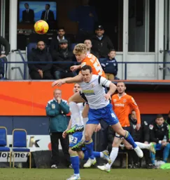 Cameron McGeehan wins an aerial duel