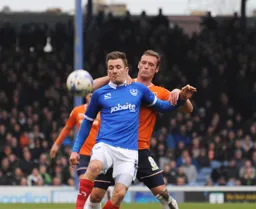 Andy Drury stays close to his man