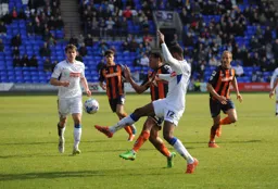 Ryan Hall wins the ball