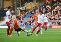 Paul Benson slips as he tackles