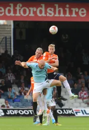 Jim Stevenson gets help from Steve McNulty