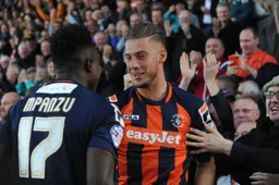 Pelly Mpanzu congratulates Alex Wall