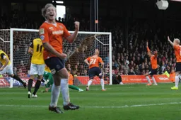 Luke Guttridge and others celebrate