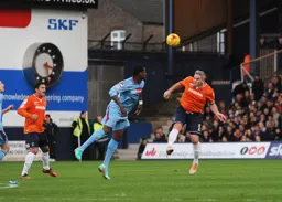 Steve McNulty clears the danger