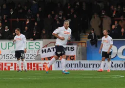 Steve McNulty sees red in the 28th minute after two bookings