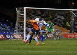 Jake Howells holds off a defender