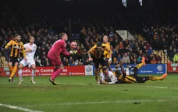 Luke Wilkinson obstructed so the keeper gathers