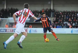Nathan Doyle looks to pass