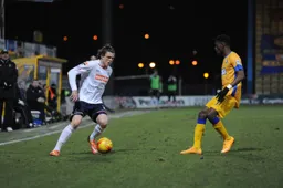 Matt Robinson attacks the defender