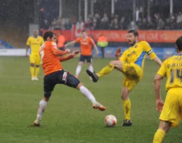 Alex Lawless puts a foot in.