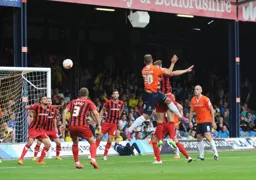 Luke Wilkinson`s towering header scores Town`s first goal