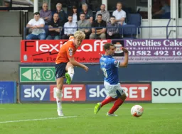 Cameron McGeehan takes a shot at goal