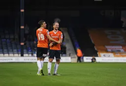 Danny Green celebrates his goal with Olly Lee