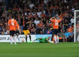 A worrying moment for Luke Wilkinson but Mark Tyler keeps the ball out