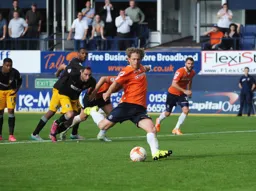 After being fouled himself, Craig Mackail-Smith puts away the resulting penalty