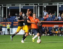 Penalty. Craig Mackail-Smith his held back by Ryan Tafazolli.