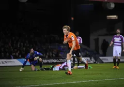 Cameron McGeehan runs away after scoring Town`s second goal
