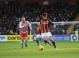 Jonathan Smith looks to start an attacking move