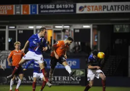 Josh McQuoid heads in Town`s second goal