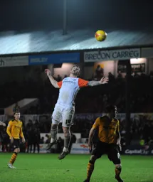 Jack Marriott is at full stretch but cannot reach the ball