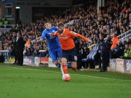 Paddy McCourt forces his way through down the left wing