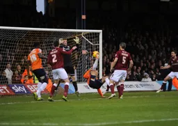 Paul Benson`s over head kick gives the Town an early lead