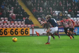 Cameron McGeehan scores Town`s first goal from the penalty spot