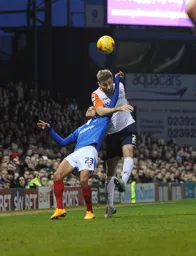 Stephen O`Donnell heads the ball forward with Kyle Bennett`s arm in his face