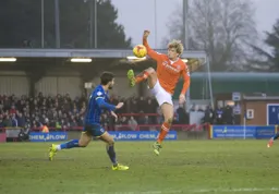 Cameron McGeehan goes in with a high boot