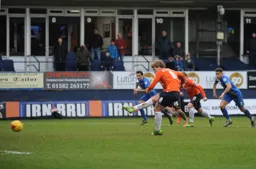 Cameron McGeehan opens the scoring from the penalty spot