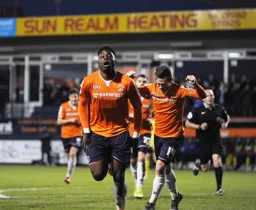 Pelly-Ruddock Mpanzu celebrates scoring the only goal of the game