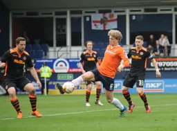 Cameron McGeehan brings the ball under control