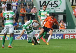 Jonathan Smith goes in for a tackle against Jakub Sokolik