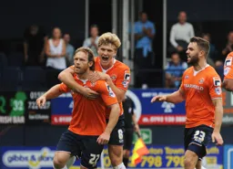 Craig Mackail-Smith celebrates with Cameron McGeehan after he had scored from the penalty spot