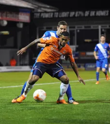 Ryan Hall shields the ball